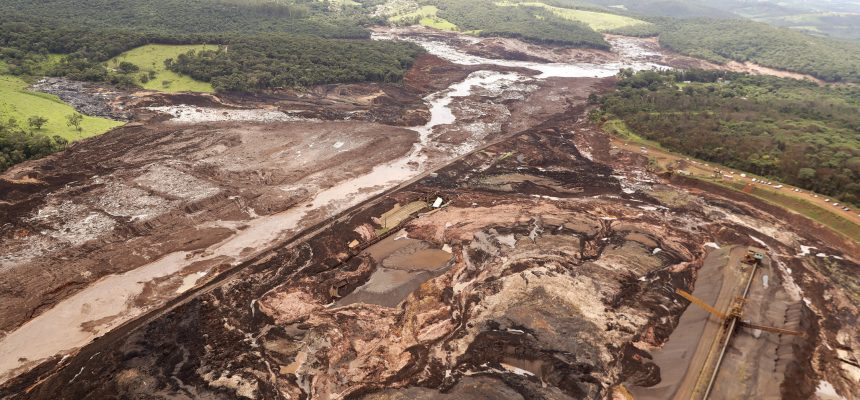 An aerial view shows the area of a collapsed dam in Brumadinho, Brazil, Saturday, Jan. 26, 2019. Rescuers searched for survivors in a huge area in southeastern Brazil buried by mud from the collapse of dam holding back mine waste, with several people dead and hundreds missing.  (AP Photo/Andre Penner)