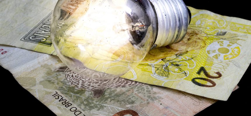 Of 50 and 20 value, currency of Brazil, on a black background, closeup macro